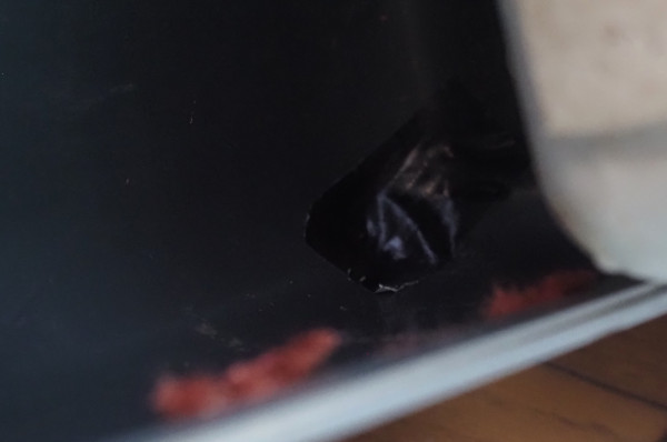 Repairing the hole in the bottom corner